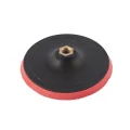 Grinding material surfaces and holders